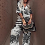 Bluzica sa V izrezom sa printom + duže pantalone – Elegantan i lagan letnji stil